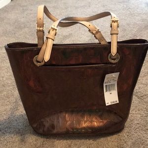 Super cute brand new Michael Kors bronze purse
